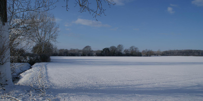 Suffolk fields covered in snow with blue sky – shows the beauty in nature giving the sense of peace, tranquillity and space that we can bring into a yoga practisc.